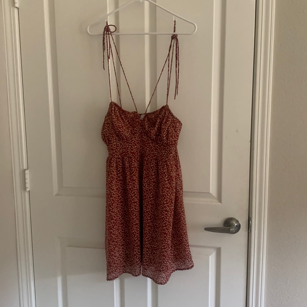 Red princess polly dress with little flowers.